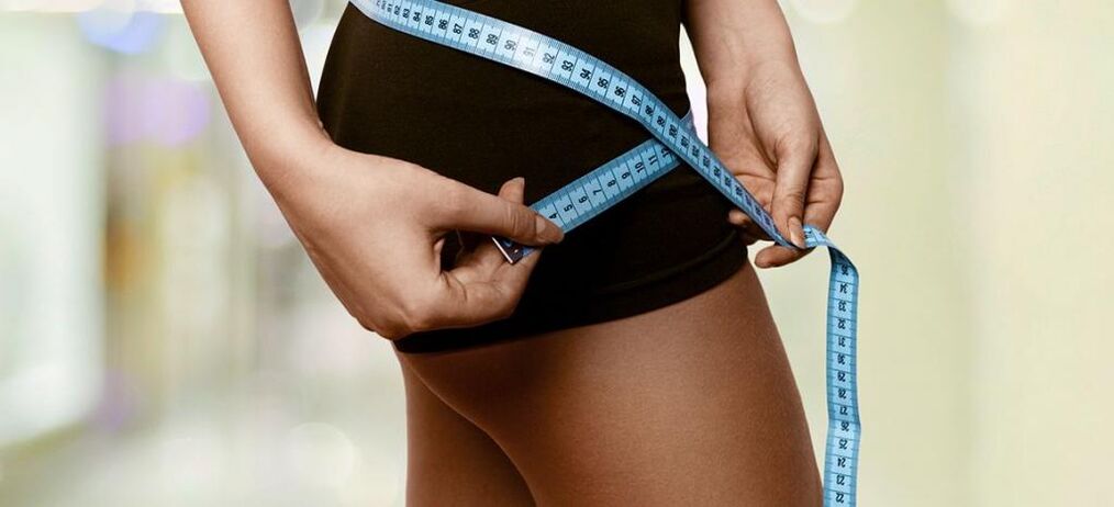 Unha muller rexistra os resultados da perda de peso efectiva
